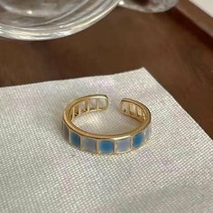 Кольцо, безразмерное, золотой, голубой Нет бренда
